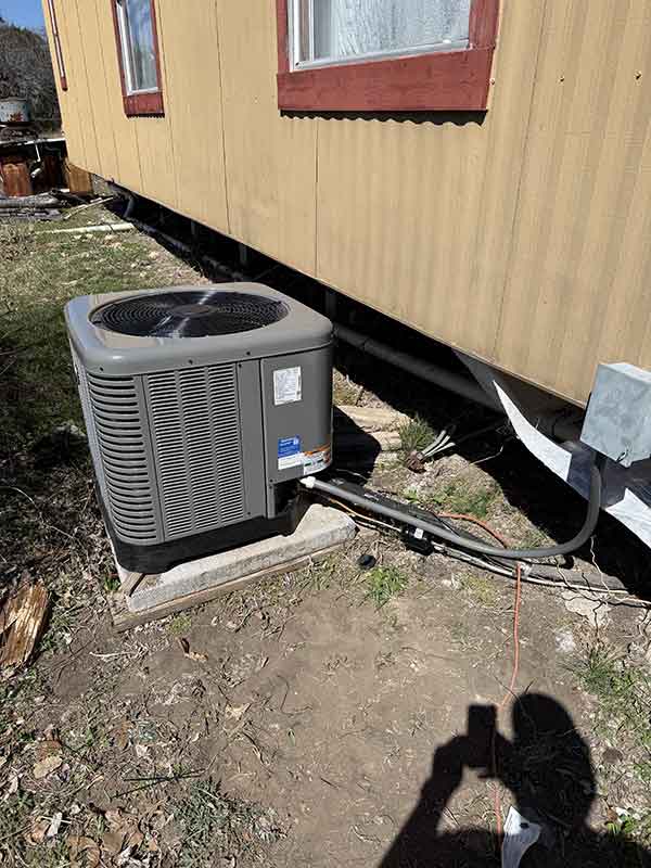 New condenser set outside a Burnet, TX home